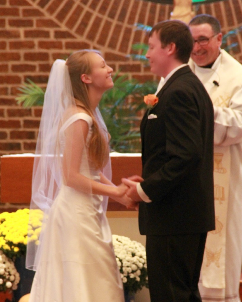 bride and groom after first kiss