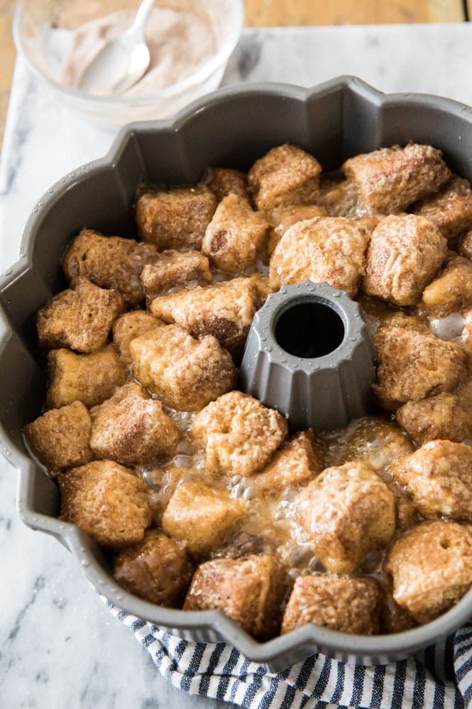 How to make the BEST Monkey Bread! This monkey bread recipe is made completely from scratch, no yeast required! #monkeybread #breakfastrecipe #sugarspunrun Monkey bread baked in bundt pan before being inverted