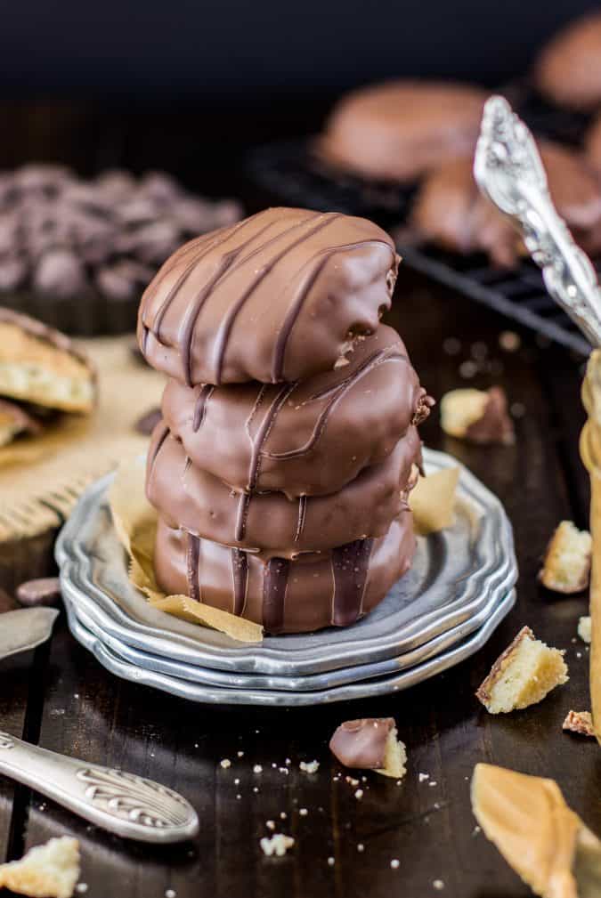 stack of 3 cookies on a silver colored plate