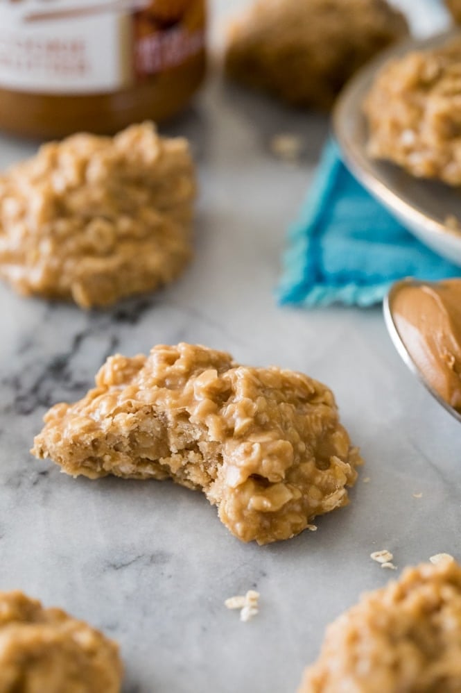 These no-bake cookies are made with COOKIE BUTTER! Such a fun new flavor and such easy cookies, no oven required! #cookiebutter #cookierecipe #sugarspunrun Cookie butter cookie with a bite out of it