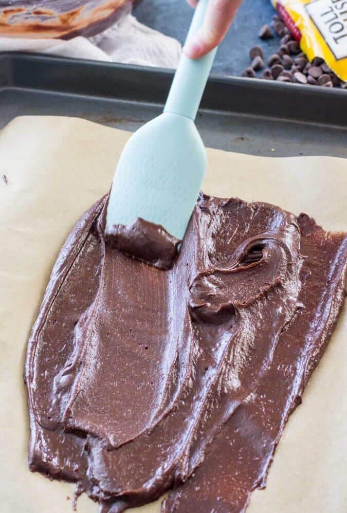 How to make homemade brittle BROWNIE BARK! Easy and so much cheaper than buying from the store! #brownie #browniebrittle #chocolate #sugarspunrun How to make brownie brittle: spread batter to potato chip thickness on parchment using spatula