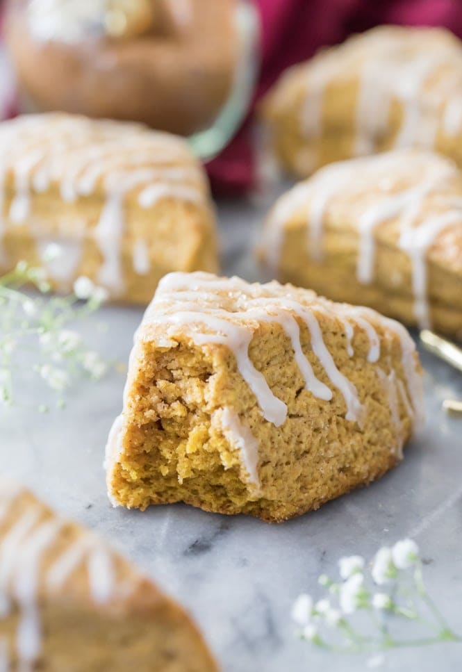 How to make the BEST Pumpkin Scones! These are so good! #fallbaking #pumpkinrecipe #scones #breakfast Soft flaky interior of pumpkin scone