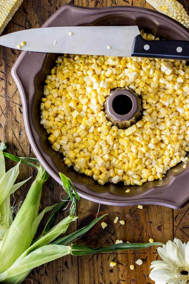 SUMMER CORN CHOWDER! A simple, hearty summer soup! #cornchowder #summerrecipe #sugarspunrun Using a bundt pan to easily cut the corn off of the cob