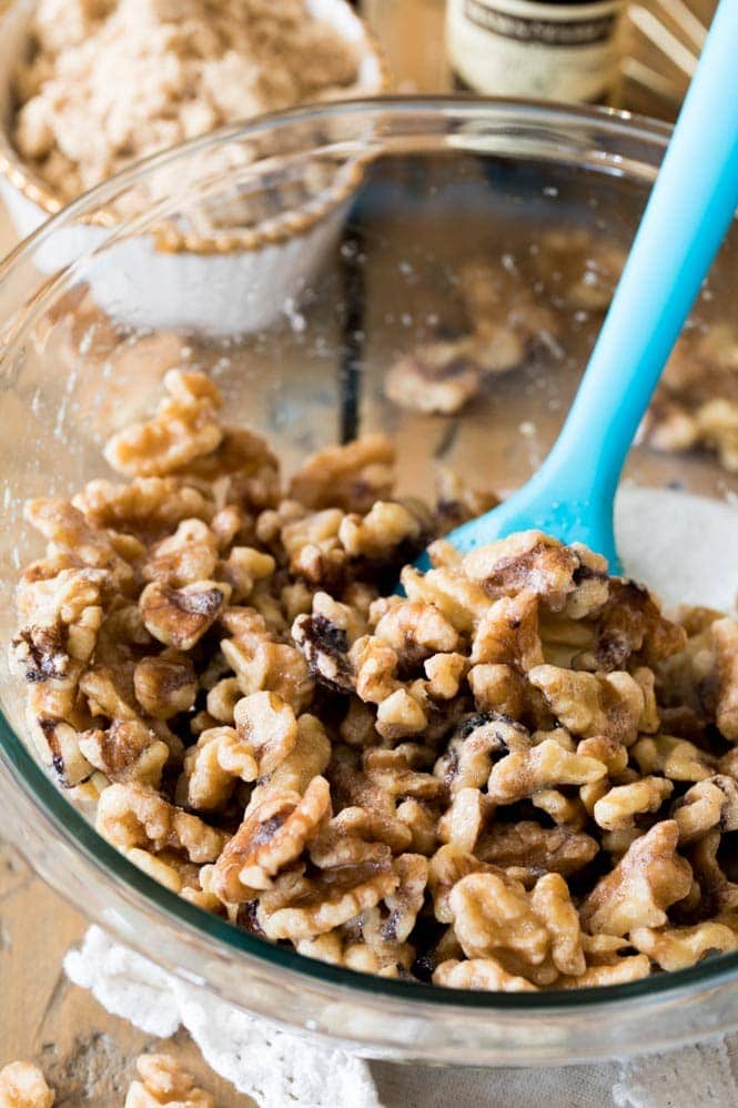 How to make Candied Walnuts -- These are SO GOOD!! #nuts #candiednuts #recipe #walnuts #dessert #baking #easyrecipe Walnut halves in a bowl
