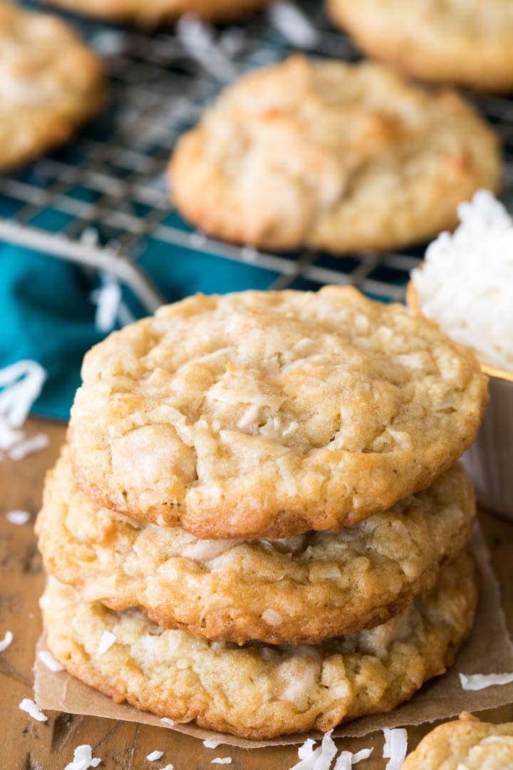 Buttery, chewy COCONUT COOKIES! These are so good! #cookies #coconut #recipe #baking #coconutcookies A stack of Coconut Cookies