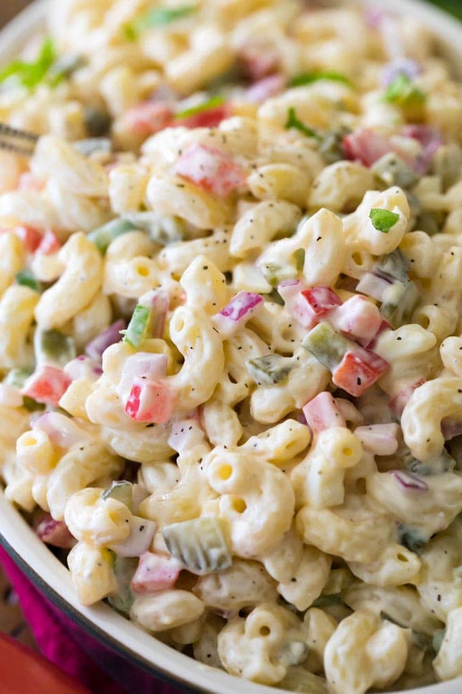 How to make the BEST Macaroni Salad! Everyone LOVED this, it got rave reviews! #macaronisalad #pasta #pastasalad #recipe #cookout #potluckfood #sidedish Macaroni salad with mayo-based dressing