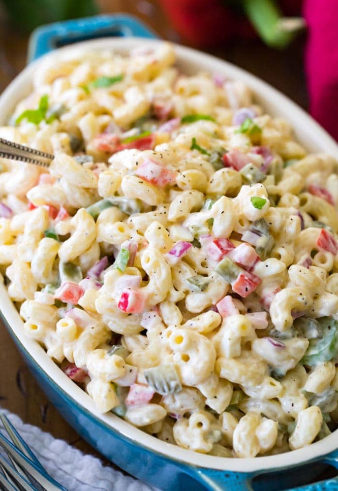 How to make the BEST Macaroni Salad! Everyone LOVED this, it got rave reviews! #macaronisalad #pasta #pastasalad #recipe #cookout #potluckfood #sidedish A heaping bowl of homemade macaroni salad