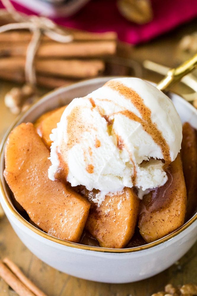 CINNAMON BAKED APPLES are an easy and delicious way to use up freshly picked apples! #falbaking #apples Cinnamon Baked Apples topped off with vanilla ice cream