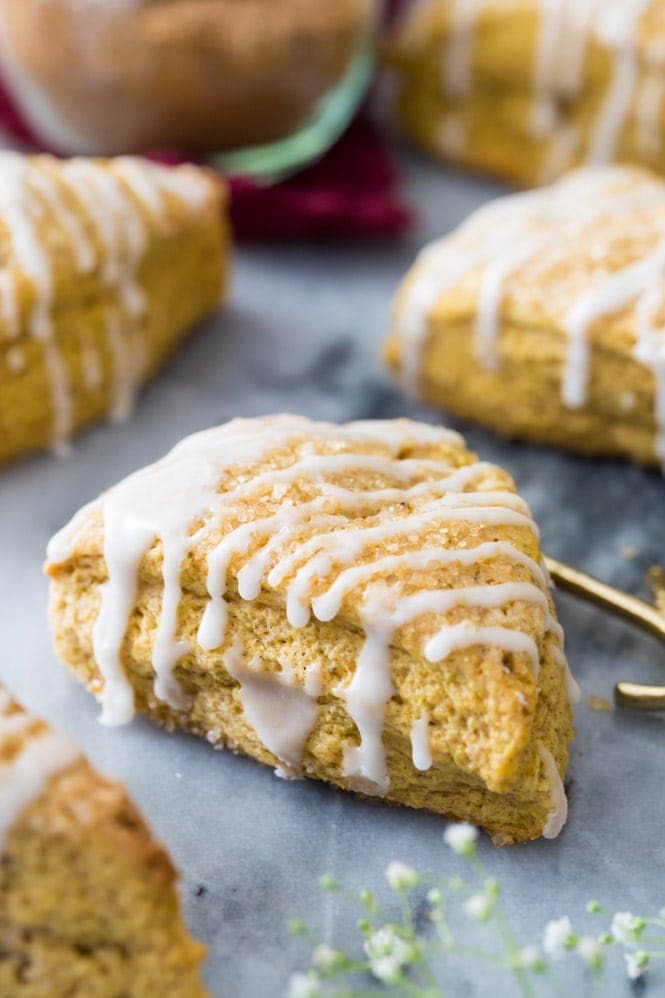 How to make the BEST Pumpkin Scones! These are so good! #fallbaking #pumpkinrecipe #scones #breakfast Warm pumpkin scone