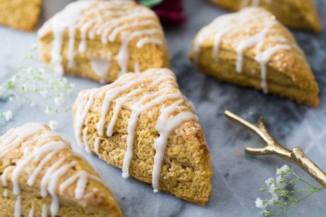 How to make the BEST Pumpkin Scones! These are so good! #fallbaking #pumpkinrecipe #scones #breakfast Freshly baked pumpkin scone