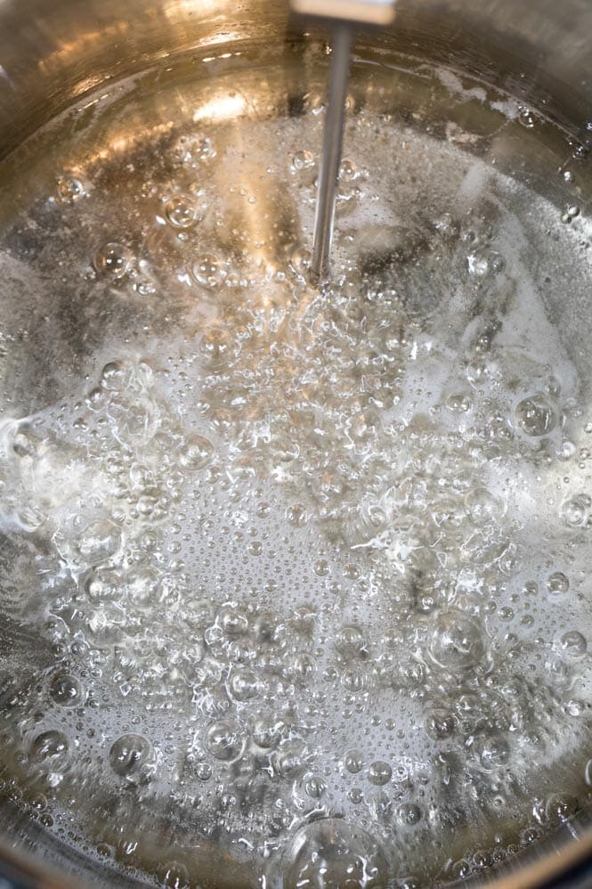 Candy thermometer in honeycomb mixture
