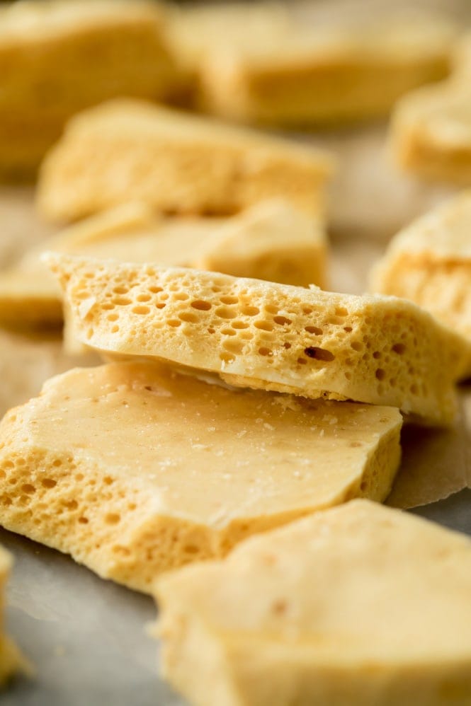 How to make HONEYCOMB CANDY! This recipe requires only a few simple ingredients and steps! #candyrecipe #christmascandy Broken pieces of honeycomb candy