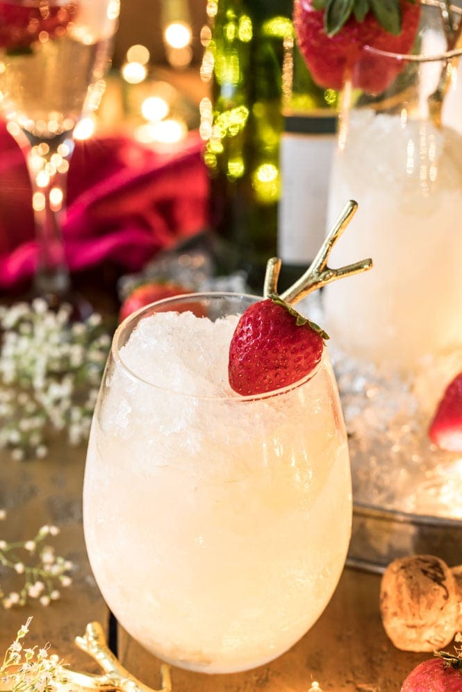 CHAMPAGNE GRANITA! An easy & delicious way to bring in the New Year! #newyearsevedessert #romanticdessert Stemless wine glass with champagne granita