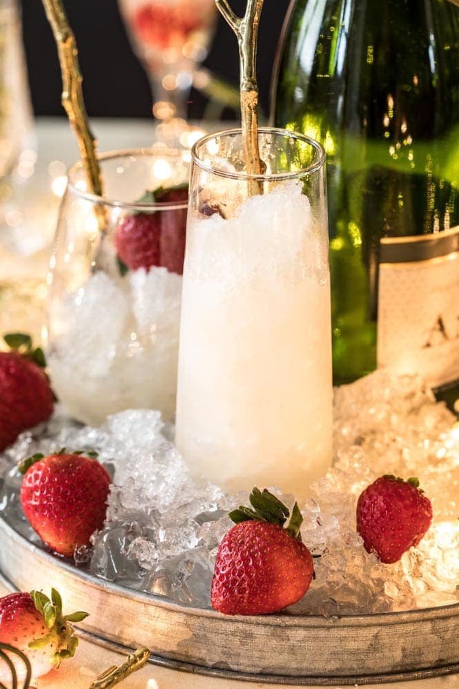 Champagne granita in glasses on tray of ice