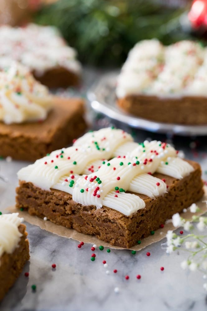 GINGERBREAD COOKIE BARS! Easier than cutting out cookies, and so soft and chewy and good! #gingerbreadcookies #christmasrecipe Gingerbread Cookie bar square with sprinkles