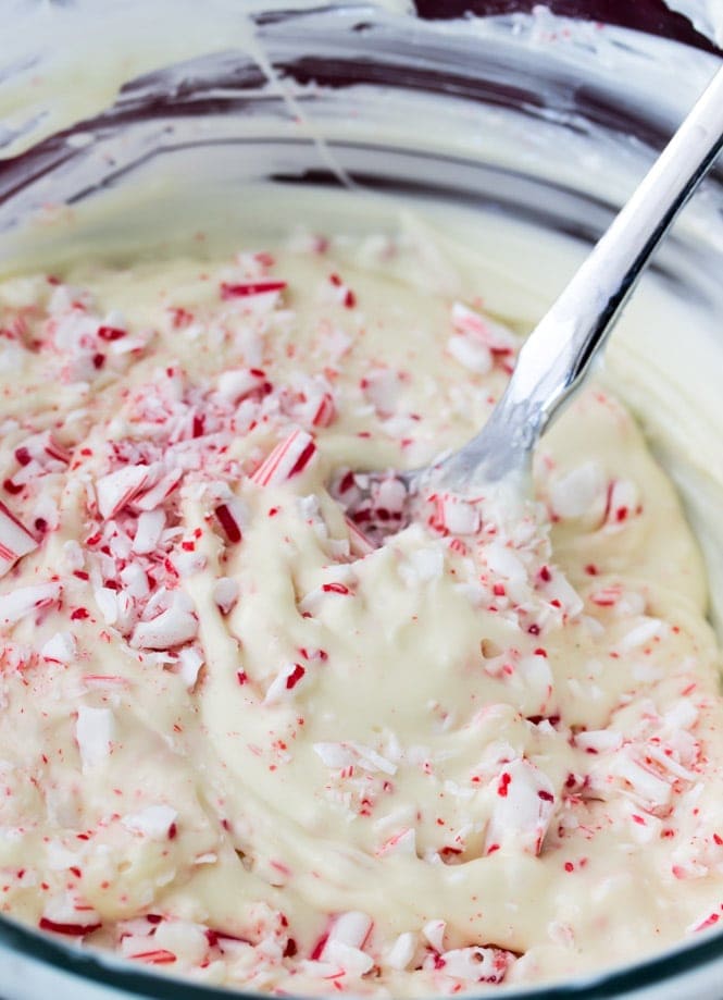 How to make an easy PEPPERMINT BARK at home! Super simple and SO good! #christmascandy #peppermintbark Peppermint Bark batter in mixing bowl