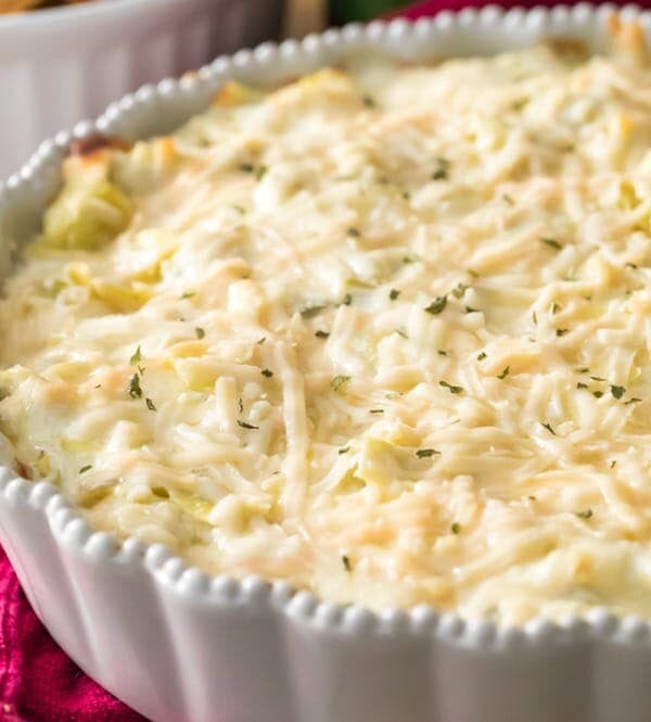 artichoke dip in white pie plate