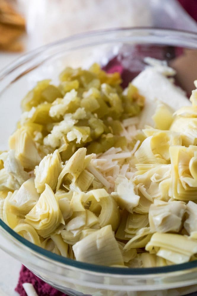 Hot ARTICHOKE DIP is the perfect Game Day Dip! So good and easy! #diprecipe #partyfood Ingredients for making Artichoke Dip