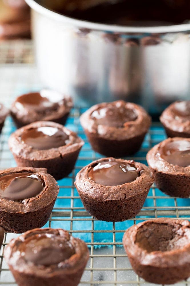 How to make from-scratch BROWNIE BITES! These have a rich ganache center! #brownies #chocolaterecipe #bitesizedtreats How to make Brownie Bites filled with chocolate