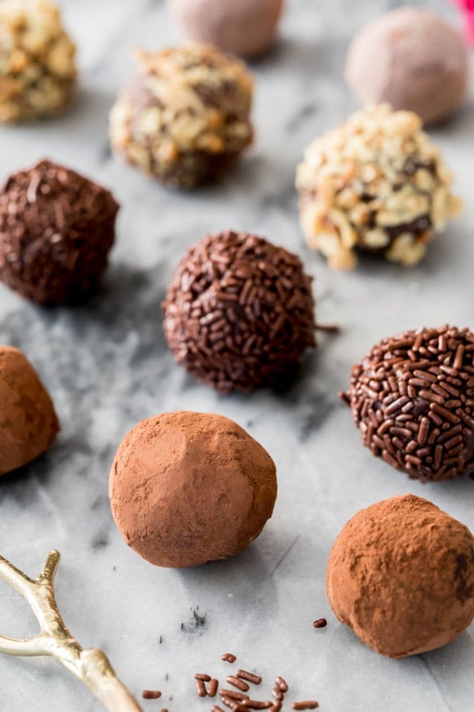 Chocolate truffles on marble surface