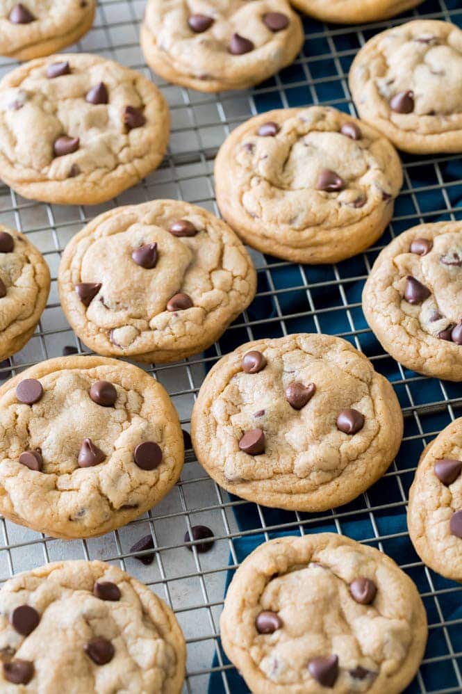 PUDDING COOKIES! This is the softest, chewiest cookie recipe you'll ever try! #cookierecipe #puddingcookies #sugarspunrun Freshly baked pudding cookies on cooling rack