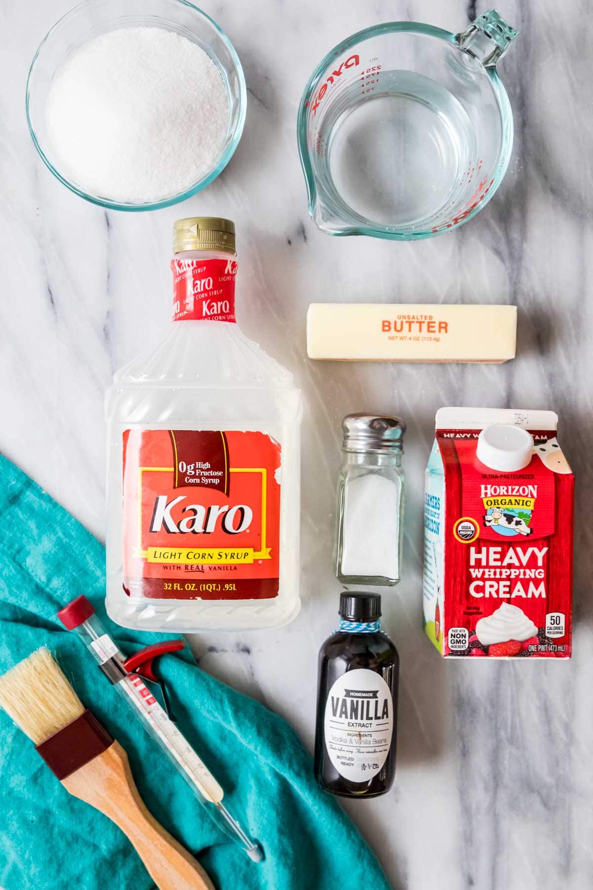 Overhead view of ingredients including corn syrup, heavy cream, sugar, and more.