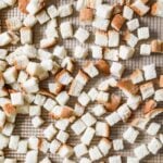 Overhead view of perfectly cut homemade bread cubes for stuffing.