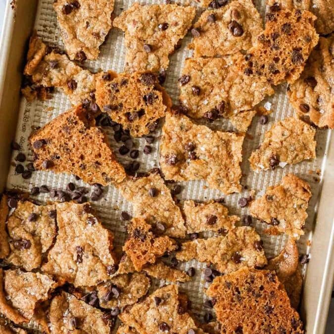 Overhead view of cookie brittle on a baking sheet.