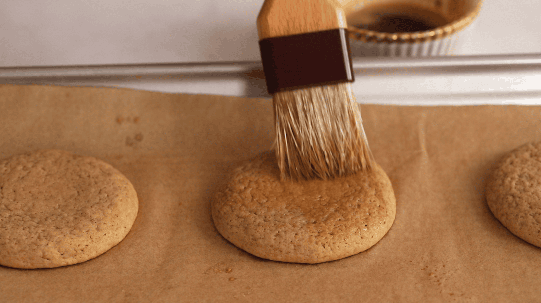 Brushing cookies with an espresso and Kahlua mixture.