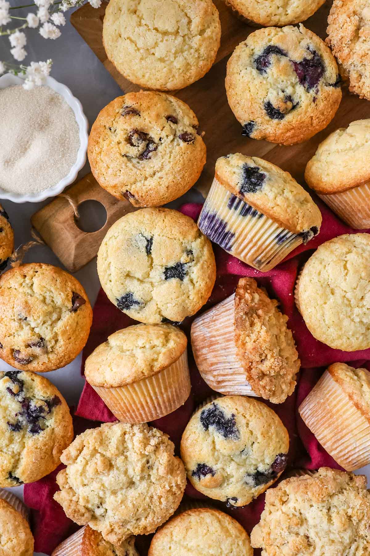 Overhead view of different muffins all made from the same batter.