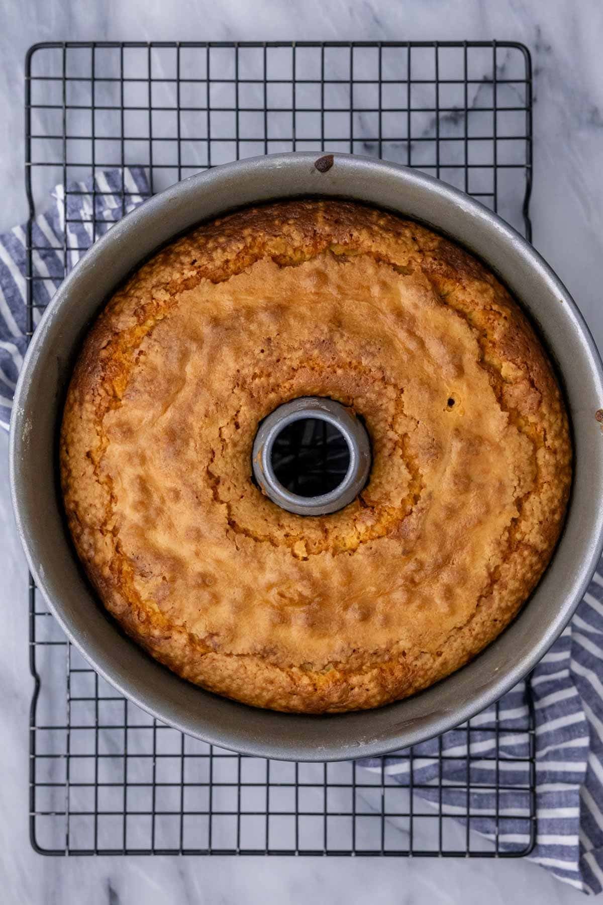 Overhead of pound cake in tube pan after baking. 